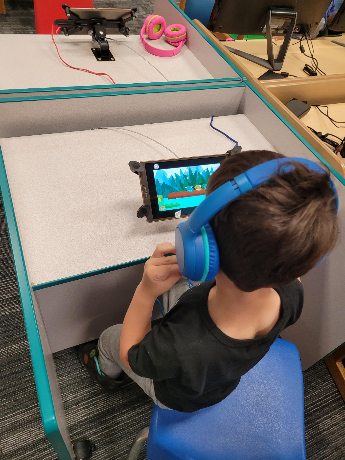 Kid at Early Learning Station